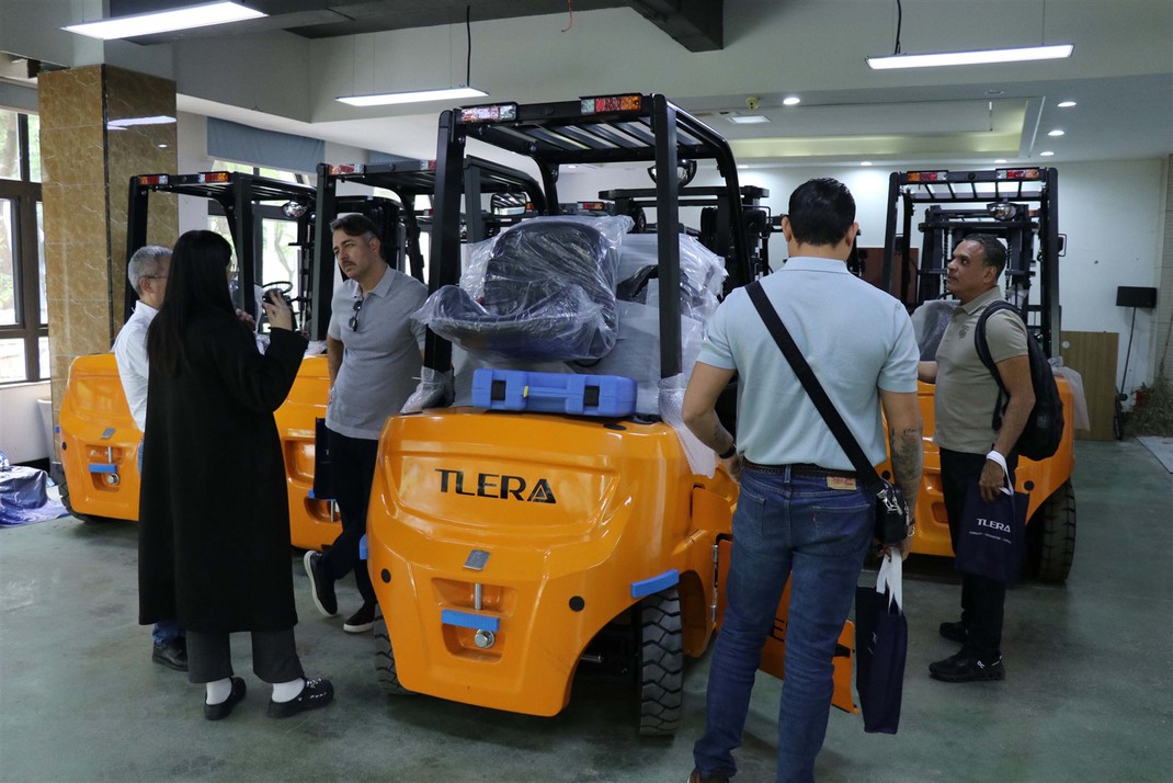 TLERA team and forklift during factory inspection